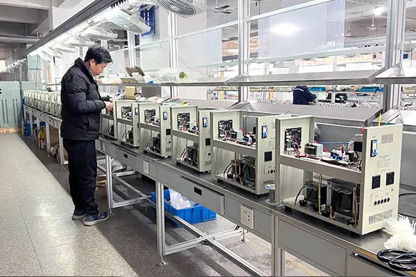 ZHENGXI factory production line of AC automatic voltage stabilizers for home, commercial, and industrial applications.